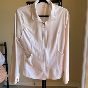 A white zipper jackets. No stains super comfortable. Smoke free home
